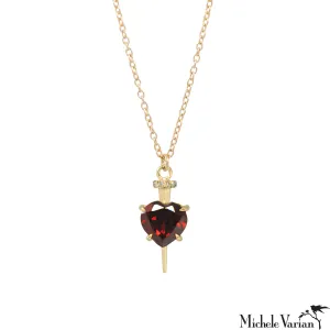 Gold Nail Through The Heart Necklace with Garnet