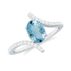 Oval Aquamarine Solitaire Bypass Ring with Diamond