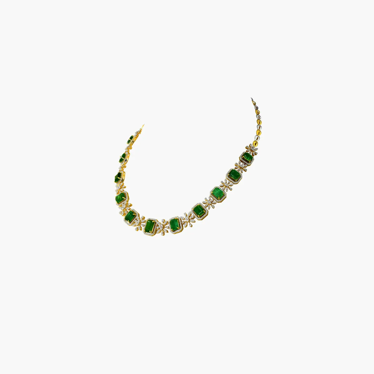 The necklace showcases a series of vibrant octagon-shaped emeralds - (PGDNE0128)